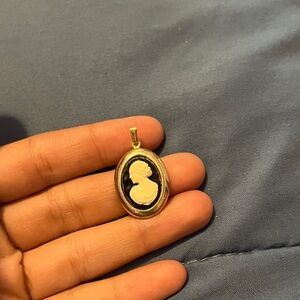 Elegant Gold and Black Cameo Pendant